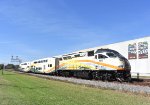 DeLand bound Sunrail train approaching Kissimmee / Amtrak Station in mid morning